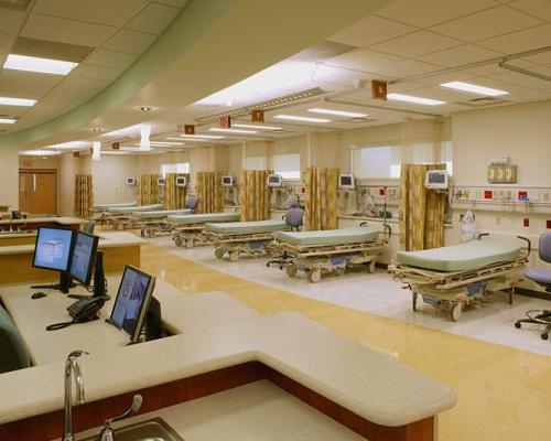 Interior photo of post-anesthesia care unit with multiple patient beds.